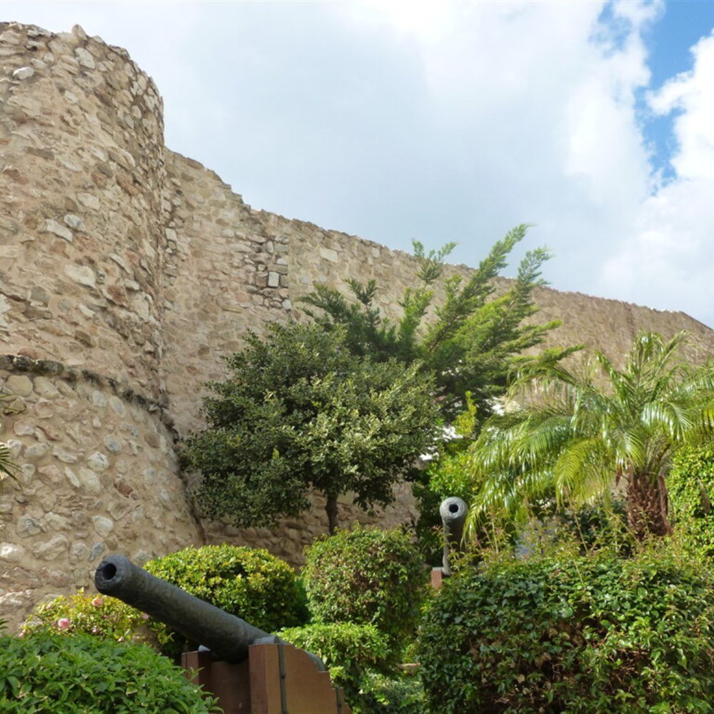 Torre&oacute; de la Pe&ccedil;a historic walls and cannons in Calpe