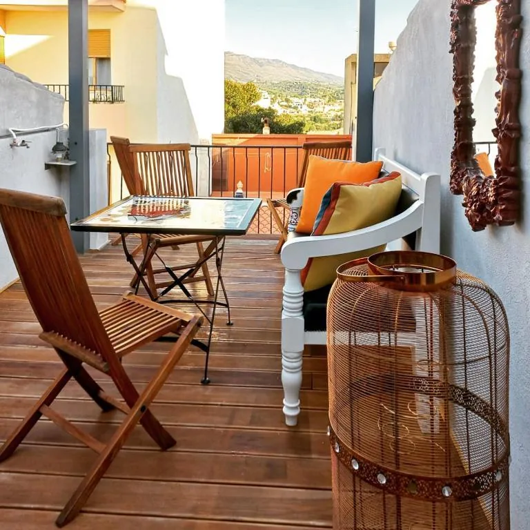Colourful lounge and dining area on the lower terrace