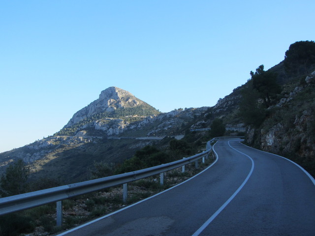 Mountain road bend near Coll de Rates for Calpe cycling routes