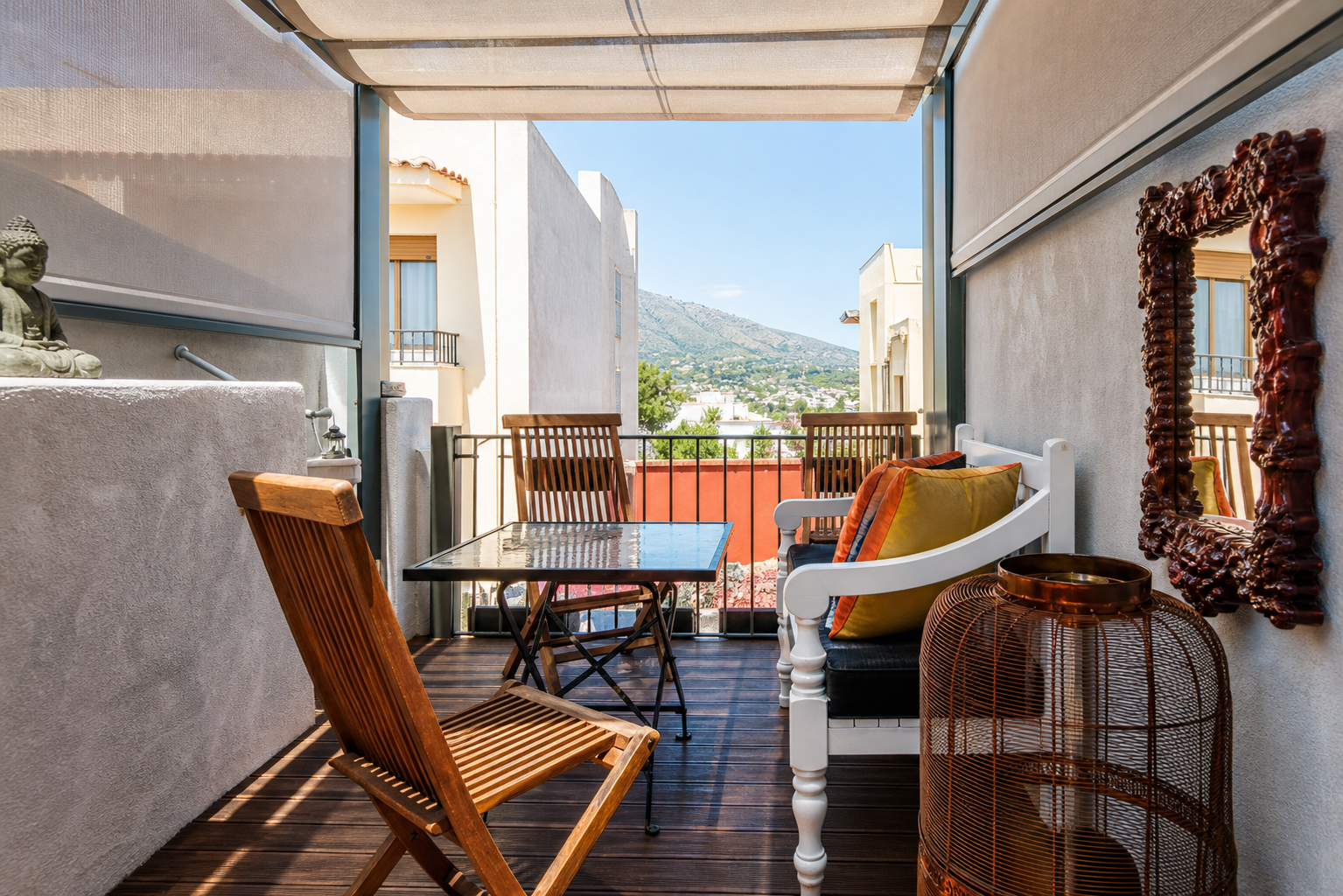 Casa Toro's covered rooftop terrace with dining table, seating and mountain views